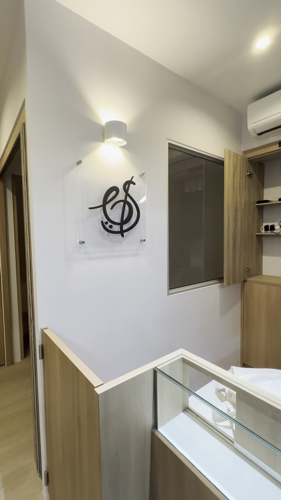 The Bowed Strings treble-clef mark at the studio reception